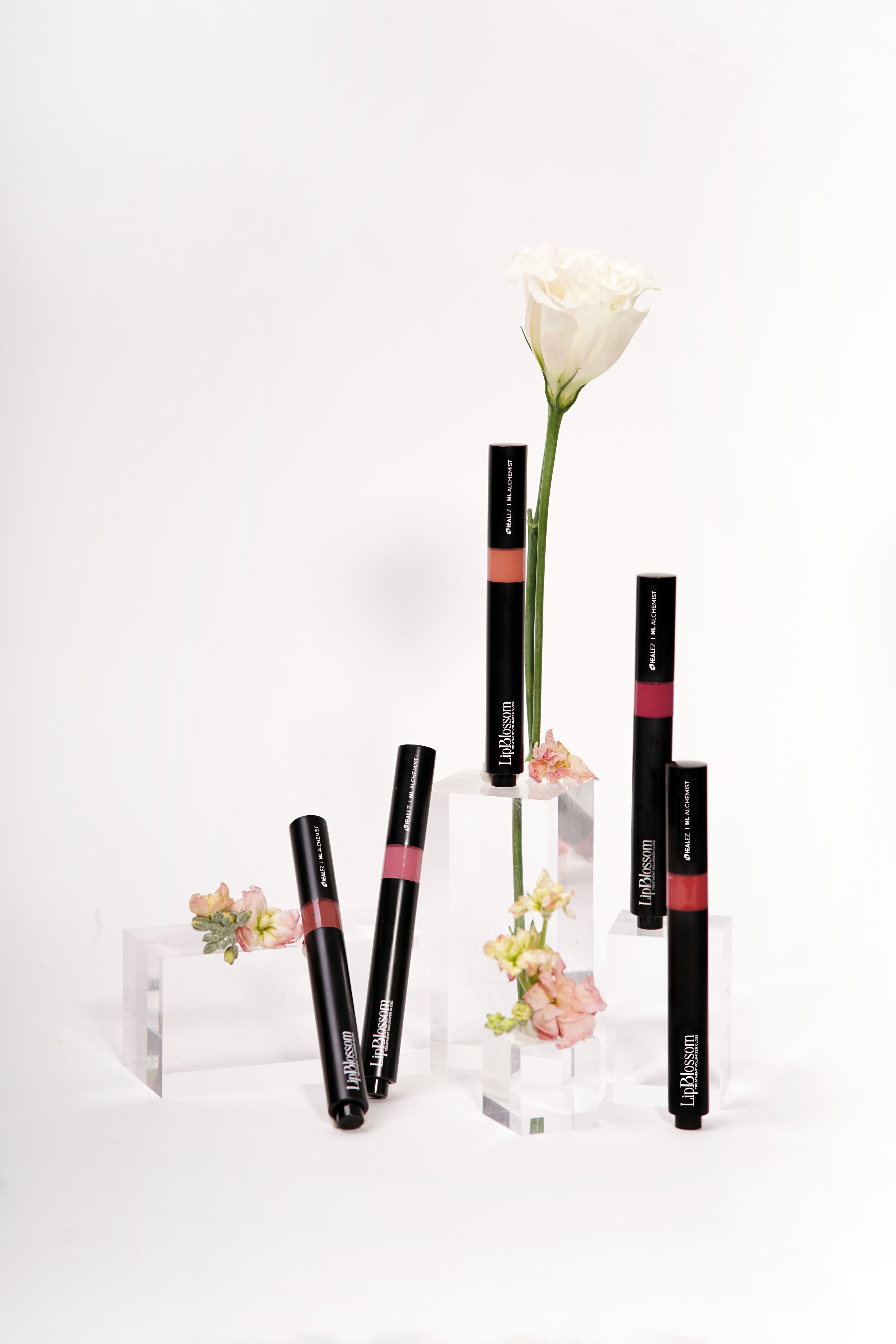 LipBlossom Treatment Volumizer Gloss